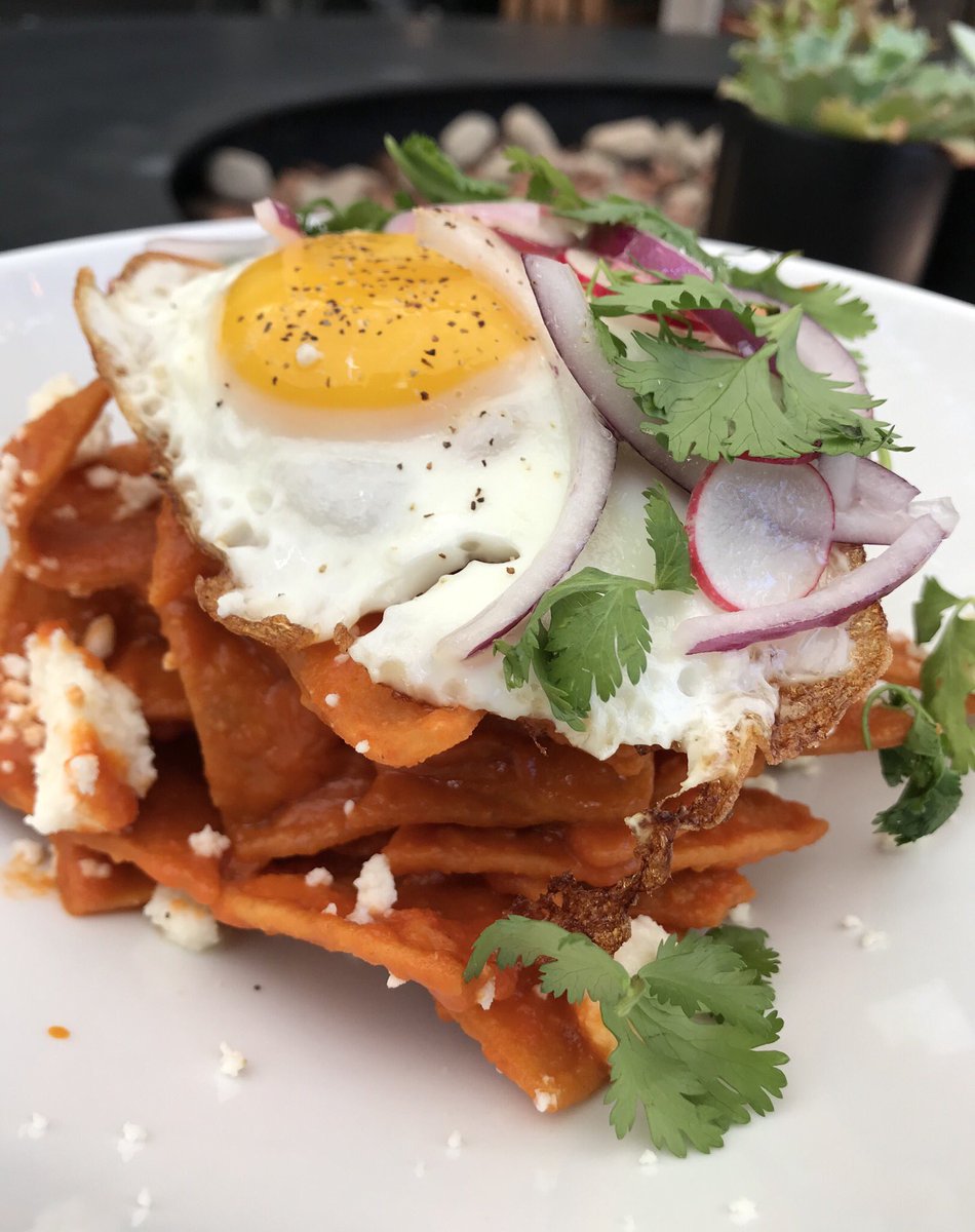 Brunch is served! 🍳 We’re open and our new brunch menu is 🔥🔥🔥 Come eat, drink and check out the games! 📷 CHILAQUILES Tortilla Chips Fried Egg, Red Onion Cilantro| Queso Fresco| Radish