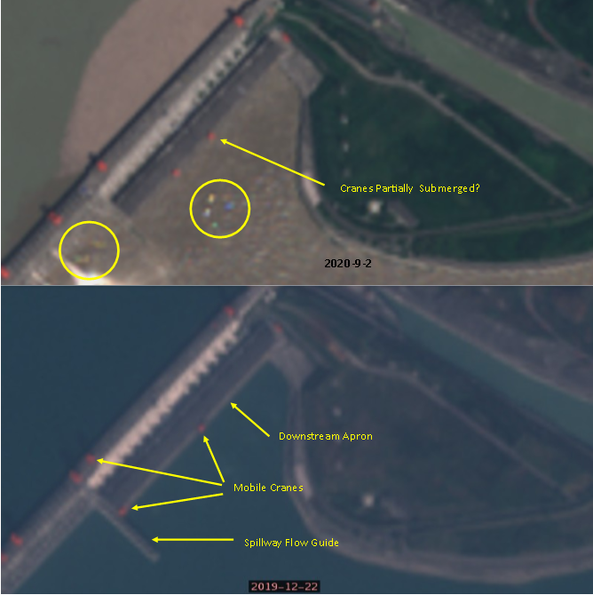 Top image was taken a few days ago on 2nd Sept, compared with one from 22-12-19Downstream water is very discolouredLower cranes appear partially submergedThe spillway guide is also underwaterVery unusual turbolence above that wallA lot of small craft activity (circled)