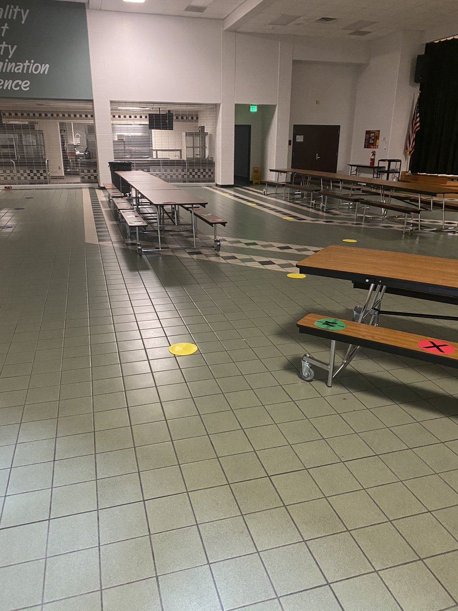 Tables in the main commons and 9th grade commons are green and red dotted for social distance seating and social distance dotted for cafeteria lines! 

#MaydeForThis