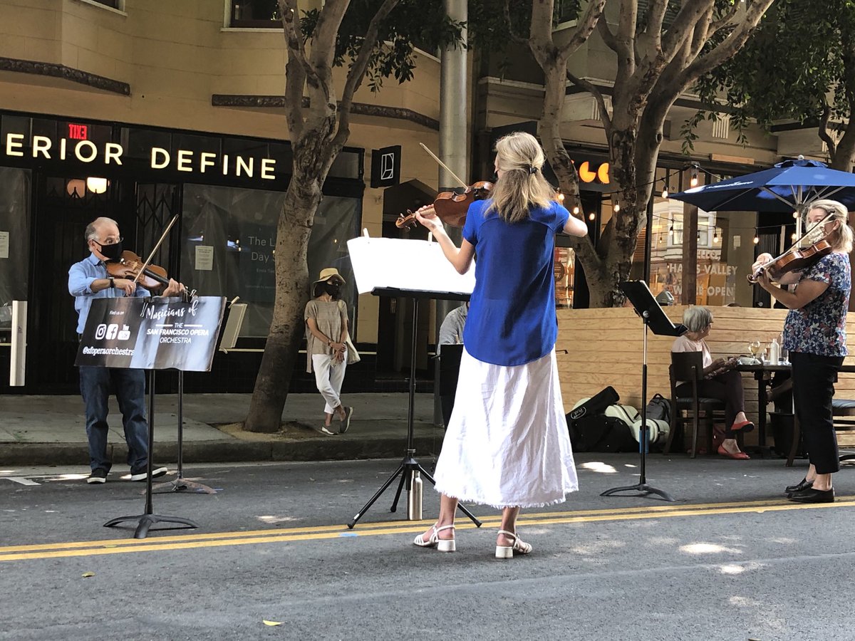 KristenBole's tweet photo. What a delight. @SFOpera  Musicians playing in Hayes Valley. Thank you ⁦@ArlequinWine⁩ for hosting and bringing music back into our #pandemic lives. https://t.co/VcbVa0tdmA