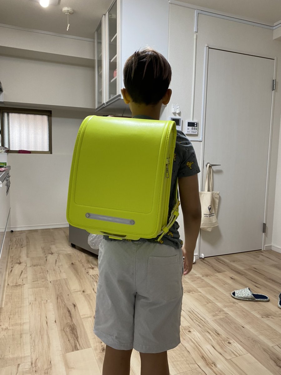 My son starts school later this week to get him mentally prepared, my wife has taken him school shopping. In Japan, kids have the same backpacks when they are in elementary. They're leather-ish bound & sturdy design.See my son trying them on & one he picked (neon, of course.)