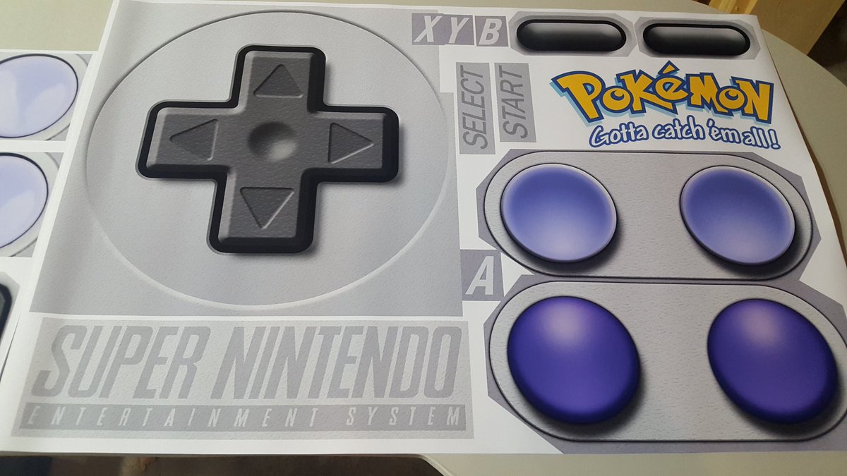 CollectNintendo's tweet photo. SNES Table / Desk Update - Buttons and lettering are printed. I did this twice since I wasn't happy the first attempt. I think I'm going to cut out the d-pad and buttons, get rid of the border and just paint it to make it look the best #snestable #nintendodesk #snesk https://t.co/zCWqXST9Mc
