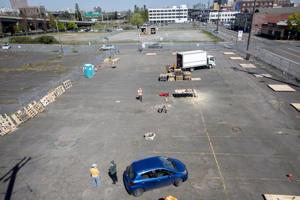 Oregonian's tweet photo. A video claimed to show an ‘antifa war camp’ in Portland. It’s actually a shelter for homeless people during the COVID-19 pandemic. https://t.co/fsjnJOrmyD https://t.co/kY6n5y8pJq