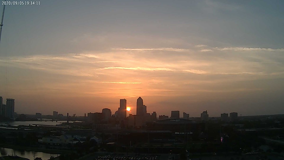 emansouri's tweet photo. Today's Mansouri Moment: 7:34 pm EDT Baseball Grounds of Jacksonville

Sun peers between two skyscrapers in Jacksonville's skyline @JaxReadyWX_Ball https://t.co/7YCkxC78YL https://t.co/Nvz0yMeIVb