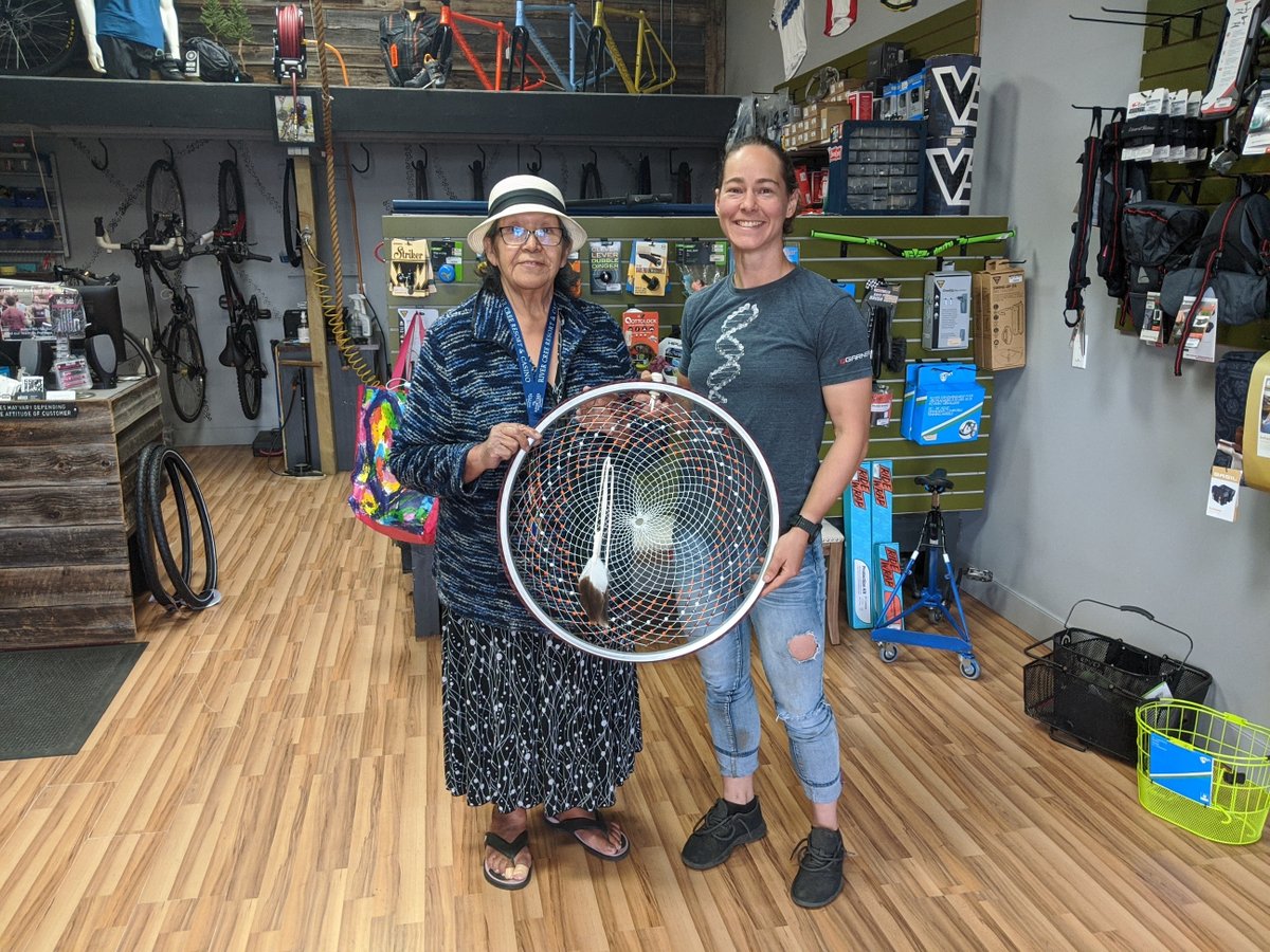 Meet Irene. 
We save our used rims for her and she takes them and turns them into intricate and vibrant dreamcatchers. 
.
She surprised us last week with our very own Bicycle Rim Dreamcatcher in custom shop colors 😍!