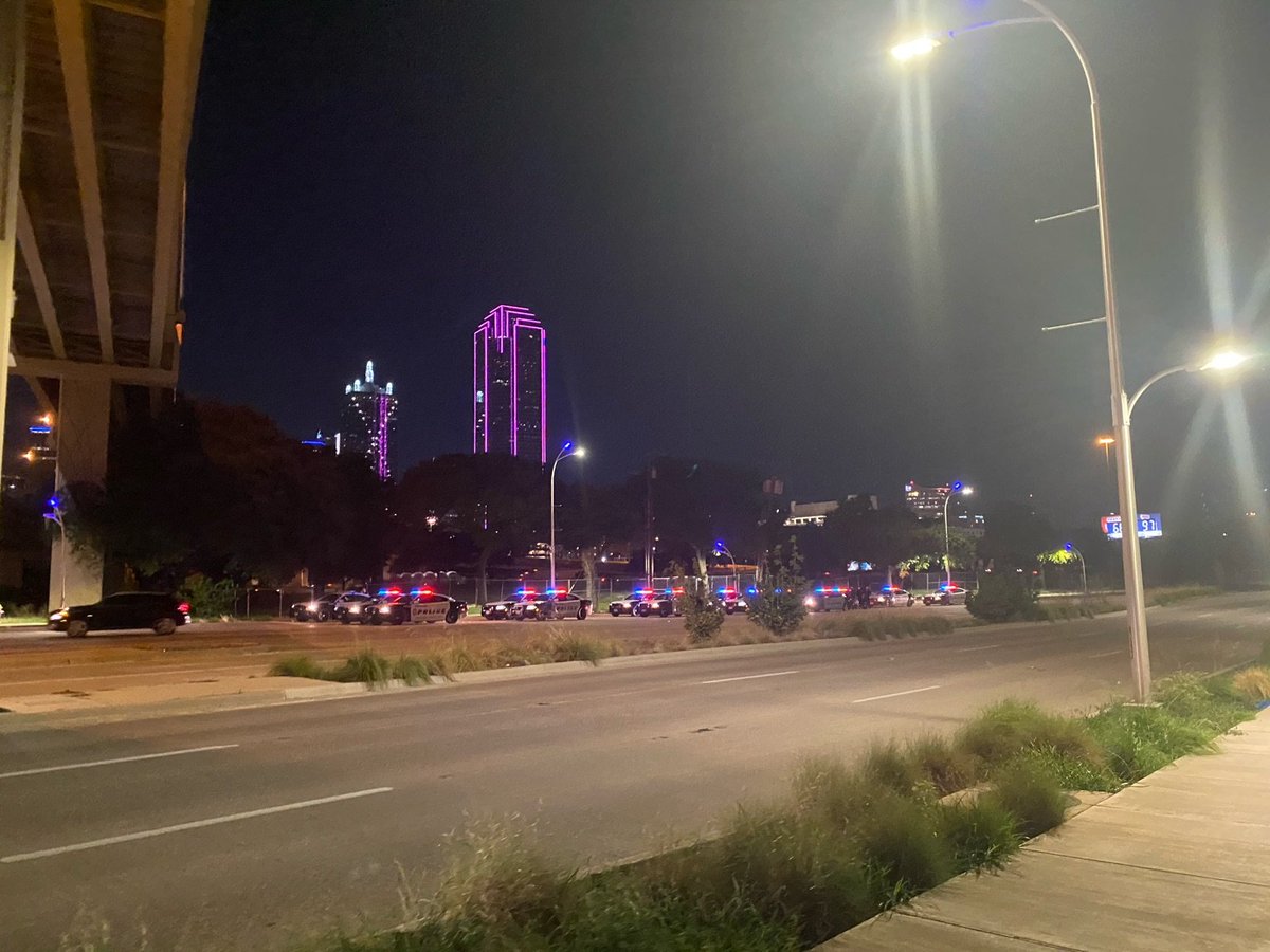 Really a nice touch from the city to match the skyline light colors to compliment the 15 police cruisers tonight. Gotta consider the aesthetic when you're preparing to violate 1st amendment rights.  #DallasProtests  #DallasWontRest
