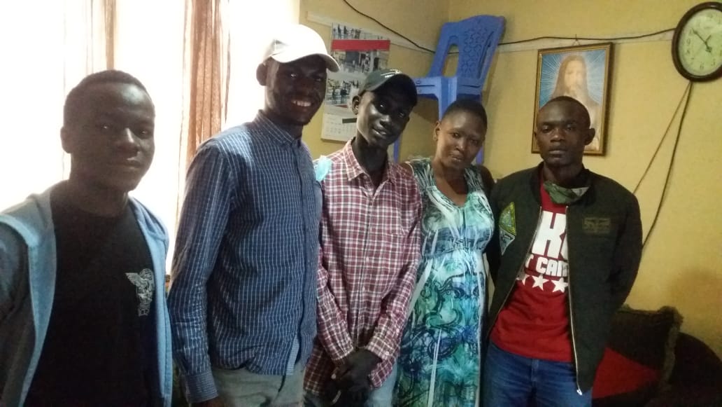 OutOfTheStreets's tweet photo. Today is a rather chilly morning in Nairobi, but for @OutOfTheStreets   there is some warmth in our hearts and here's why. The three people(circled in blue) in these photos had been separated from each other for quite a while...... https://t.co/4IUQvZ29vL