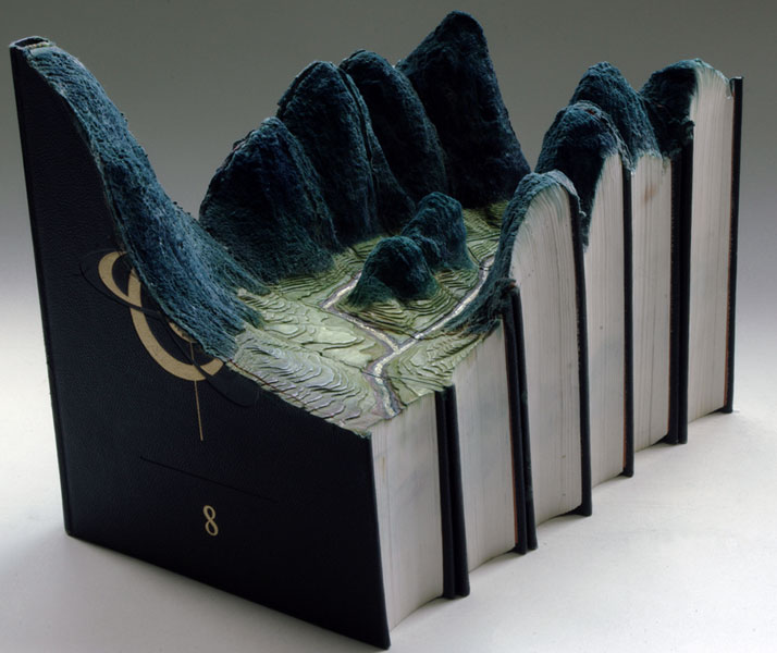 4. Guy Laramée, Canadian artist who sculpts books. Amazing work.