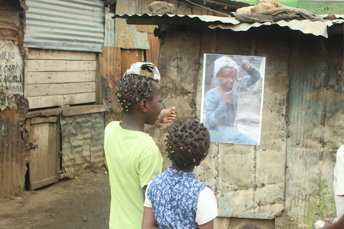MathareF's tweet photo. We never disappoint. We did it in style once more. Mabatini, Hospital and Mlango Kubwa Wards residents saw the beauty of Mathare slums through the photos that we exhibited. Thank you Africalia Belgium for the support.  @africalia @GlobalGiving @resolutionproj @Pollinationproj https://t.co/7WqPVUg4mW