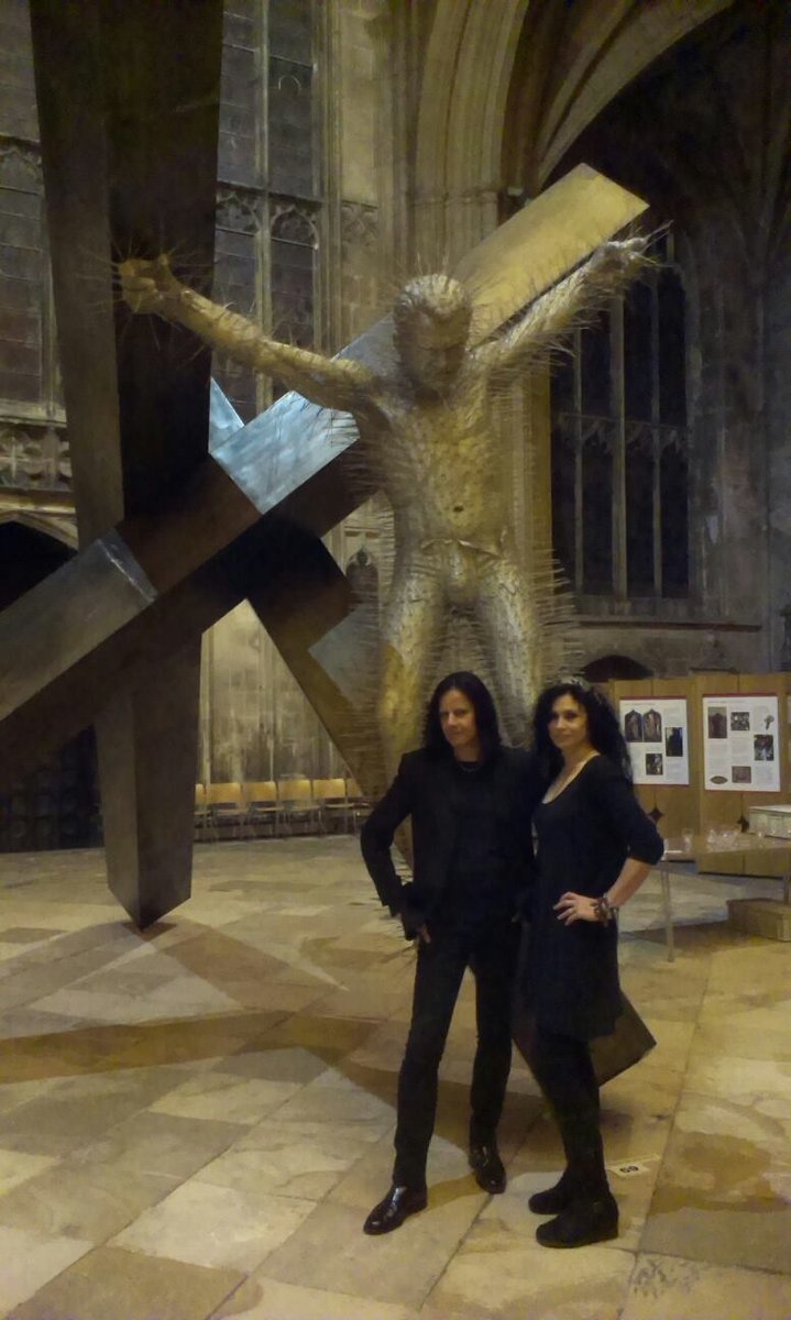 CandiaMcKormack's tweet photo. Ten years ago today, two teeny tiny Goths attempted an unselfconscious pose next to great art at @GlosCathedral... #Crucible2 #DavidMach #TheThief @GalleryPangolin @PangolinLondon https://t.co/AXEKAwSwTL