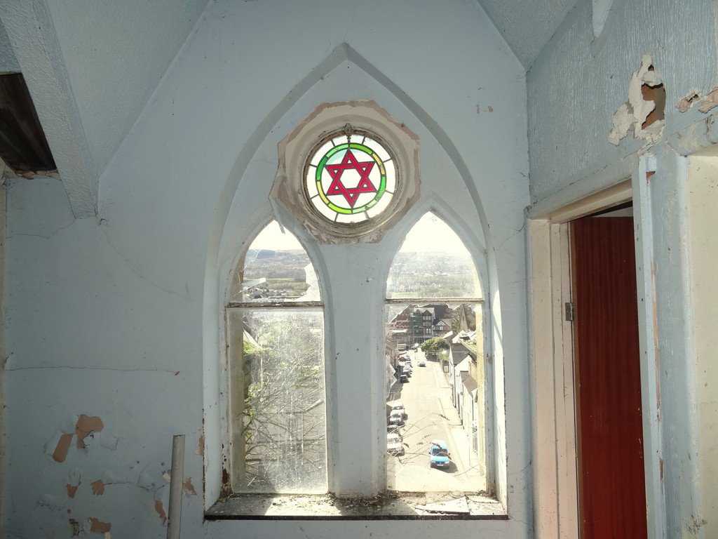 Merthyr Synagogue was built in 1877 in Merthyr, South Wales.It is the oldest synagogue in Wales and it is soon to open as a museum. It was built in the Gothic Revival style and it is the only synagogue in the world to feature a dragon on its gable.