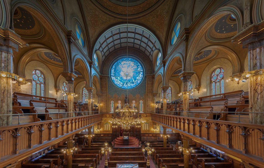 The Eldridge Street Synagogue was built in 1887 in Chinatown, New York City.It was one of the first synagogues built by Eastern European Jews in the Americas and its a great example of the Moorish Revival style.
