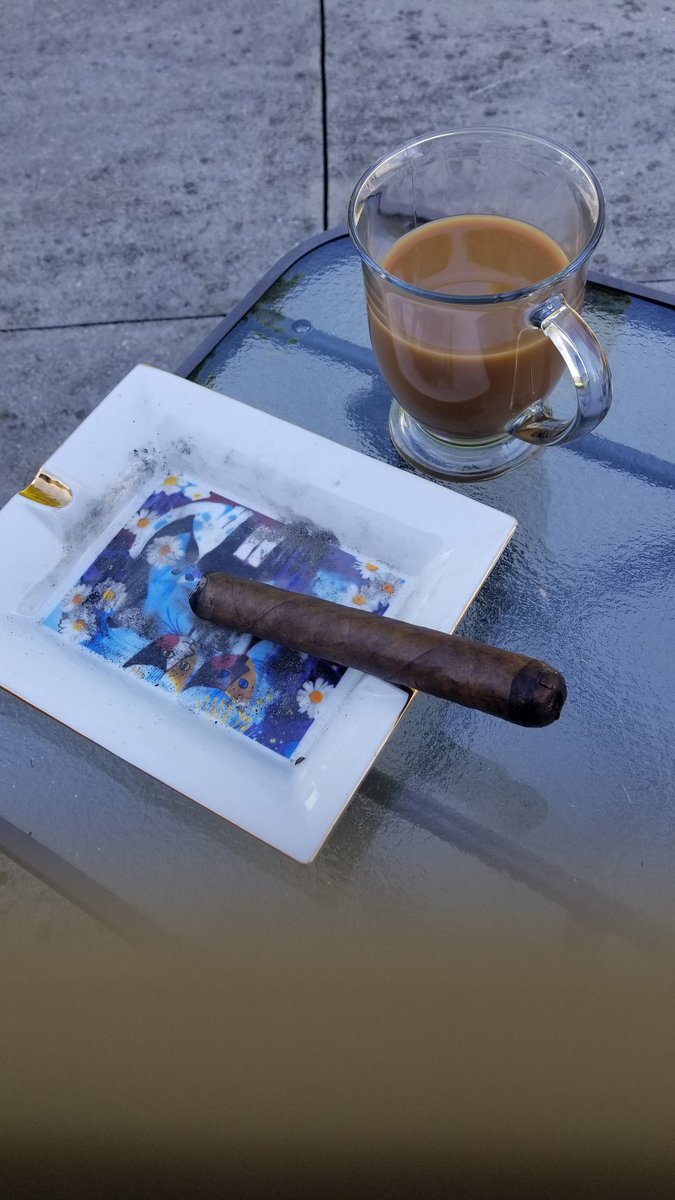 Awesome outside today. Coffee and cigar outside today.