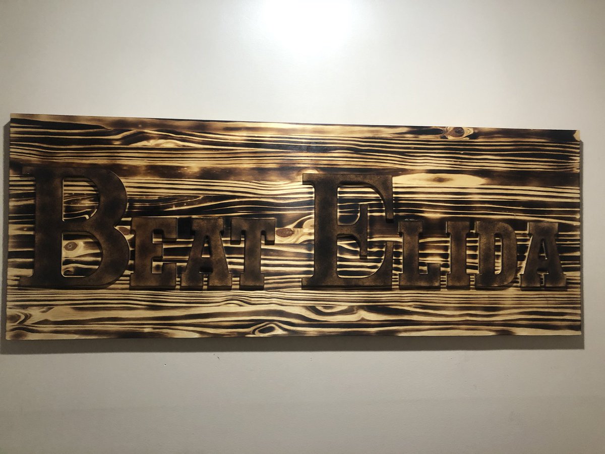 CoachReindel's tweet photo. Walking into our basement this sign is hanging there reminding everyone that passes it, this is not just any week, This is ELIDA WEEK. #BeatElida https://t.co/1xnPmnAVUM