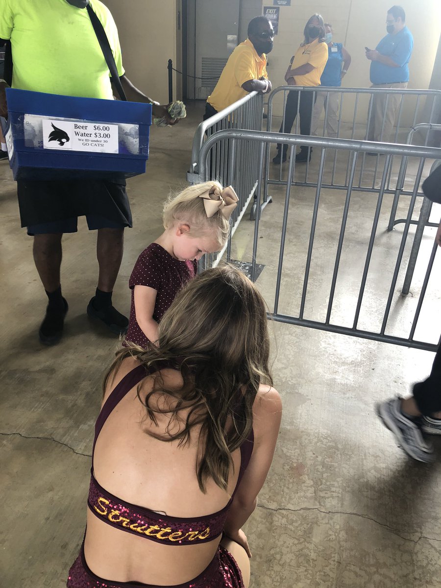 only1tommadden's tweet photo. I can’t tell you how sweet these two #TexasStateStrutters were to my granddaughter 😻 She gets scared when the cannon goes off so to cheer her up we went 👀 for @TXSTBoko at halftime & could only find these sweet ladies to put a smile back on her face😽 https://t.co/PXWGyCSipL