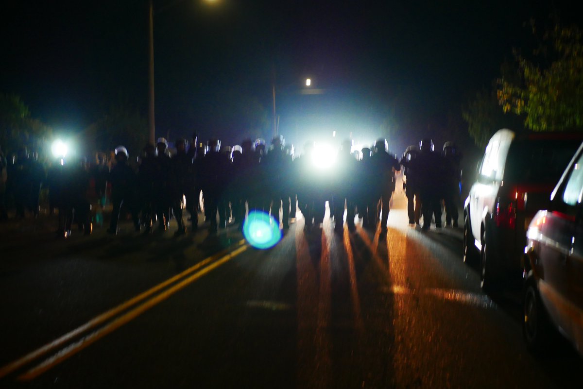 9/6 0036 Protesters regroup back at Ventura Park and police advance again. Gas is used, a firework explodes as protesters retreat once more. #pdxprotest  #BLM  #portland  #blacklivesmatter    #portlandprotest  #defendpdx  #BLMprotestsvideo:  https://twitter.com/BaghdadBrian/status/1302552570792083456