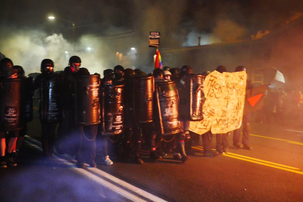 9/5 2121-2122 The shield wall retreats as  #PPB and  #OSB advance, more gas or smoke is fired as officers approach.  #pdxprotest  #BLM  #portland  #blacklivesmatter    #portlandprotest  #defendpdx  #BLMprotestsvideo:  https://twitter.com/BaghdadBrian/status/1302518181899063296