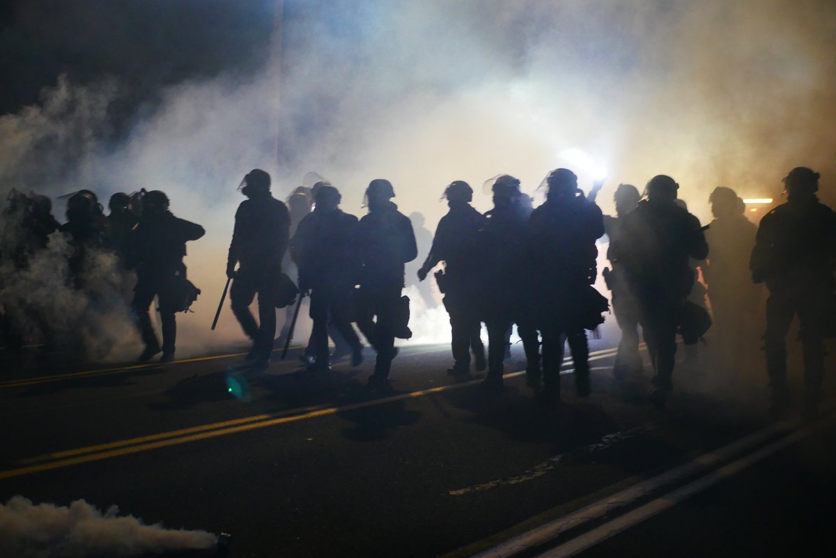 9/5 2121-2122 The shield wall retreats as  #PPB and  #OSB advance, more gas or smoke is fired as officers approach.  #pdxprotest  #BLM  #portland  #blacklivesmatter    #portlandprotest  #defendpdx  #BLMprotestsvideo:  https://twitter.com/BaghdadBrian/status/1302518181899063296