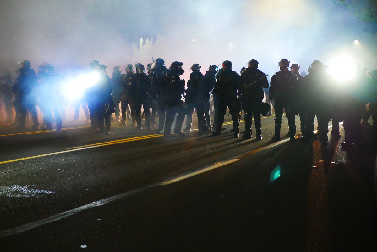 9/5 2124 Officers regroup on Stark Avenue before retreating.video:  https://twitter.com/BaghdadBrian/status/1302465125702492160 #pdxprotest  #BLM  #portland  #blacklivesmatter    #portlandprotest  #defendpdx  #BLMprotests