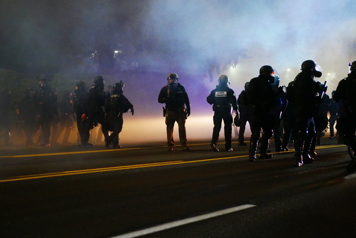 9/5 2124 Officers regroup on Stark Avenue before retreating.video:  https://twitter.com/BaghdadBrian/status/1302465125702492160 #pdxprotest  #BLM  #portland  #blacklivesmatter    #portlandprotest  #defendpdx  #BLMprotests