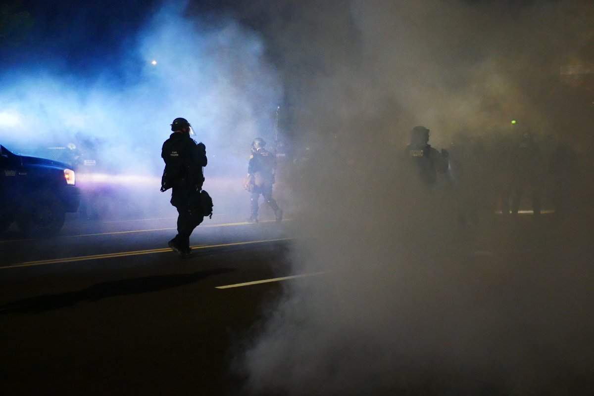 9/5 2136-2137 Officers run toward the crowd as a small group of protesters straggles behind the rest. Police then regroup at the intersection of 117th and Stark (I believe) #pdxprotest  #BLM  #portland  #blacklivesmatter    #portlandprotest  #defendpdx  #BLMprotests