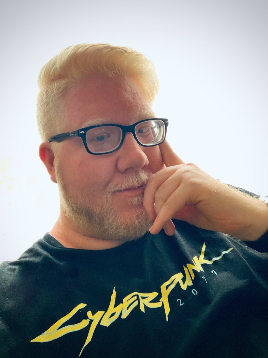 Photo of my resting my cheek in my hand in a pondering position.