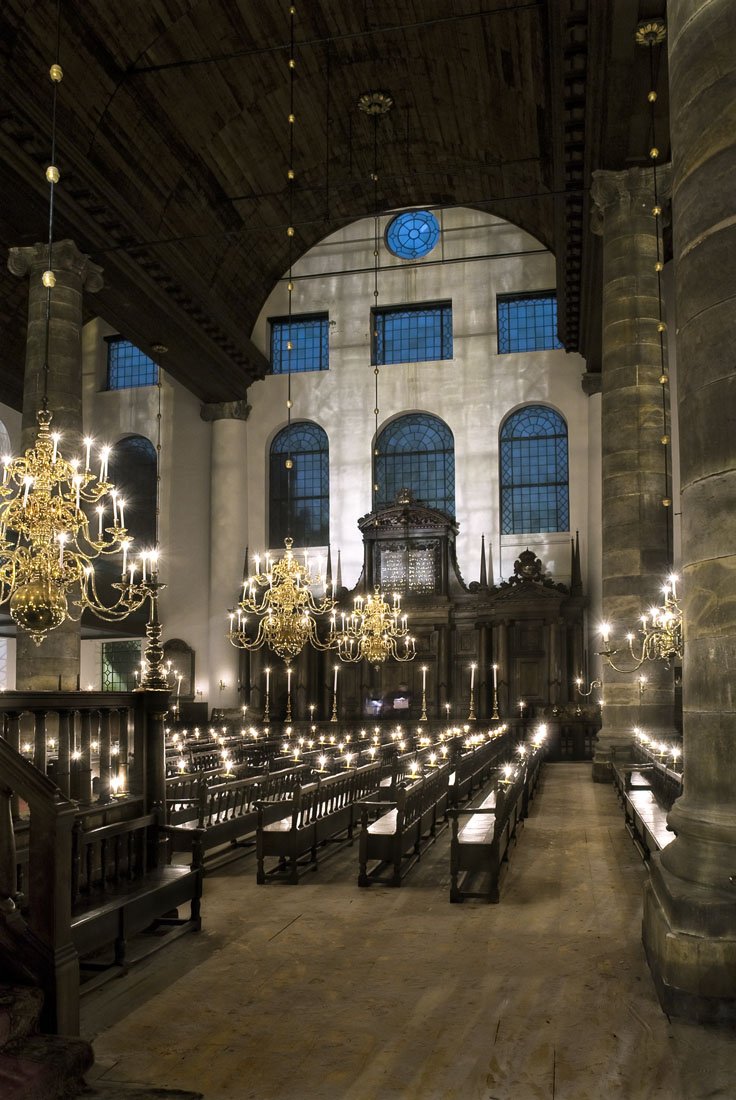 The Portuguese Esnoga was built in 1675 in Amsterdam by a community of Sephardi Jews who were expelled from Portugal.It was built in the Iberian style, modelled after Solomon's Temple and it was the largest synagogue in the world upon its completion.