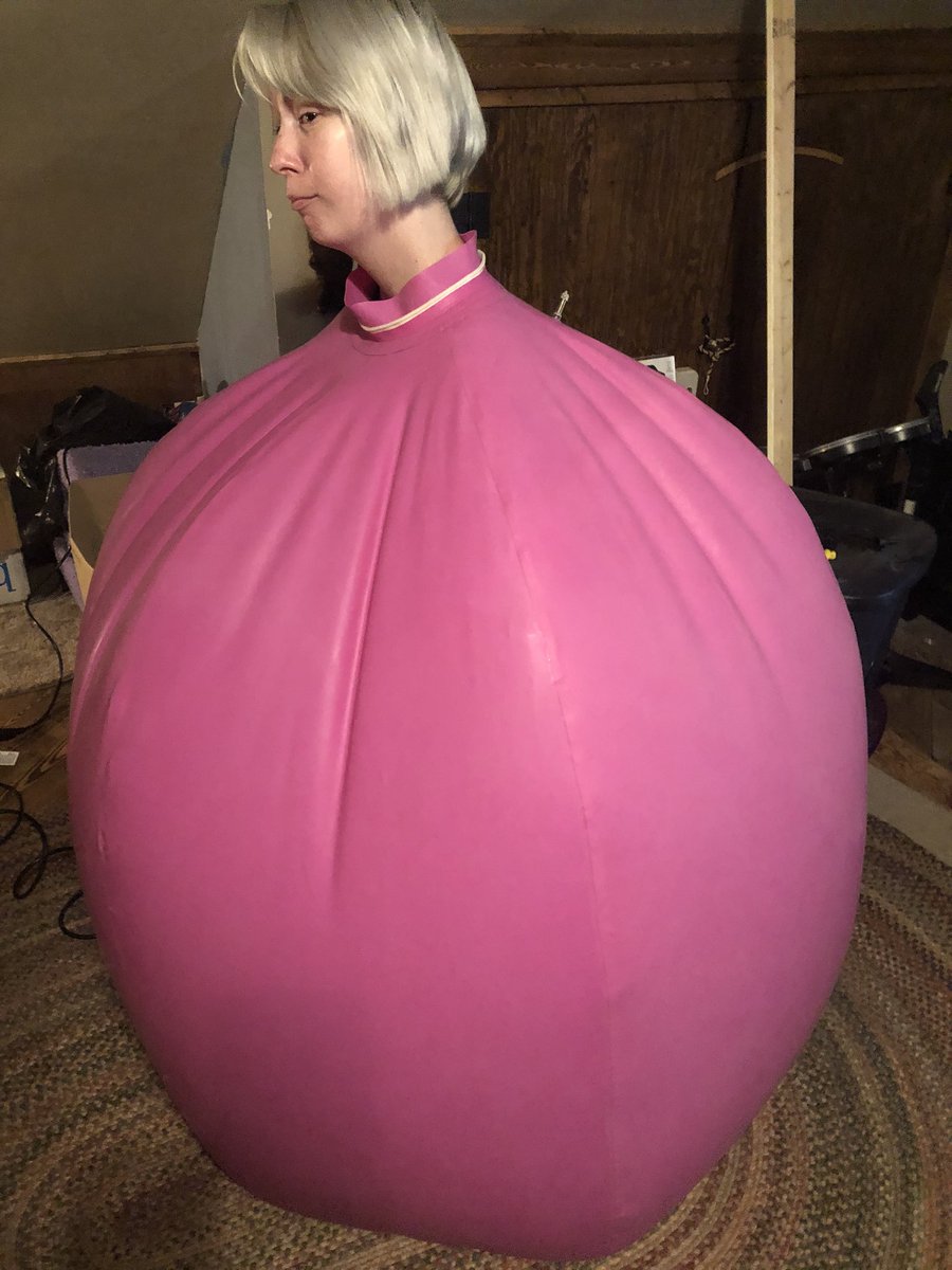 Annalease6's tweet photo. The kitty decided to try out the ball suit. So here she is all puffed up like a balloon. (Yes this is my irl face) it took 2 minutes to get this big and round. Can’t wait to get my fursuit to get the actual kitty as a ball😸🎈🤗 #bodyinflation #inflation #balloon #inflatafur https://t.co/tWbKLtbmZj