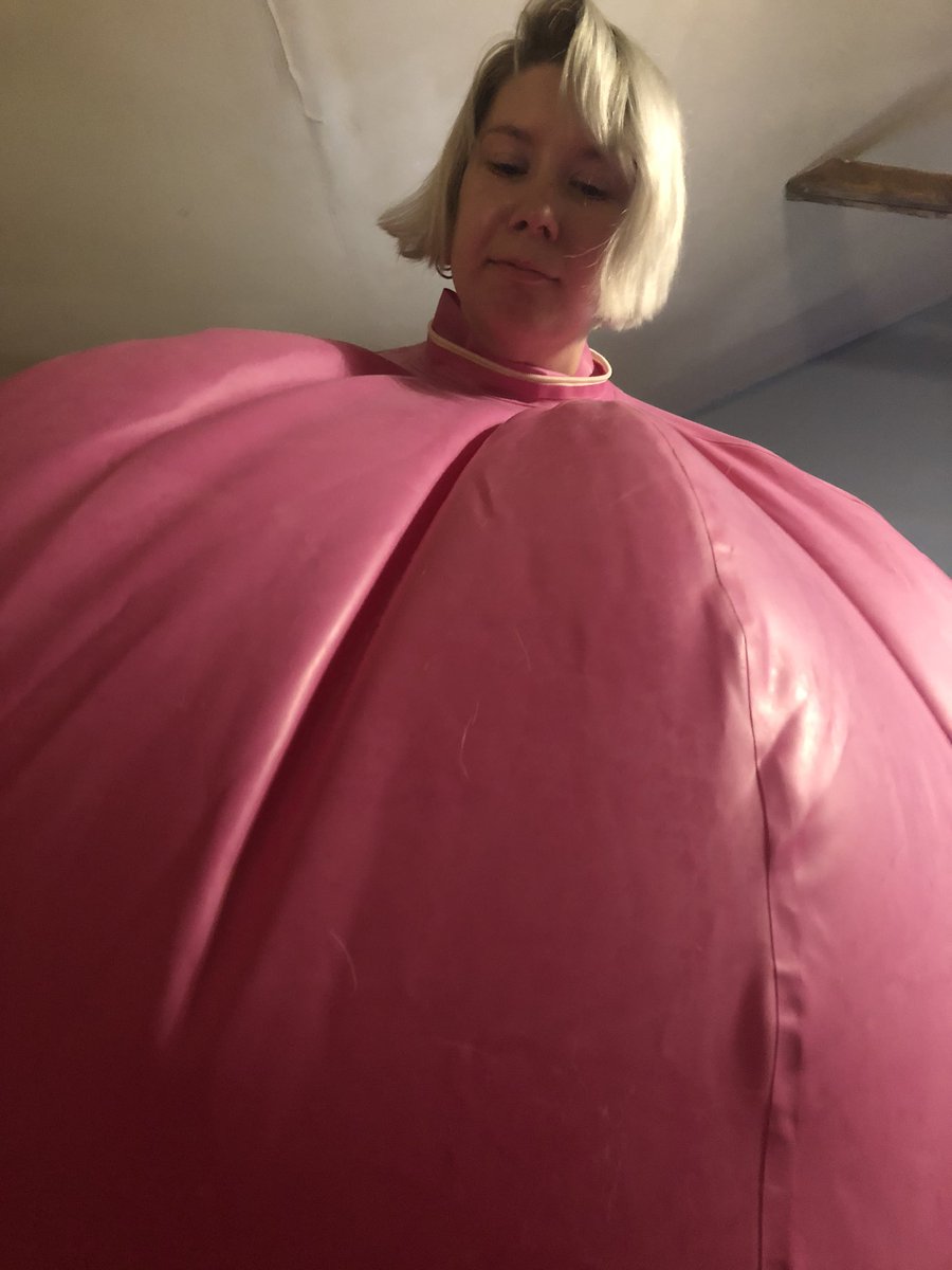 Annalease6's tweet photo. The kitty decided to try out the ball suit. So here she is all puffed up like a balloon. (Yes this is my irl face) it took 2 minutes to get this big and round. Can’t wait to get my fursuit to get the actual kitty as a ball😸🎈🤗 #bodyinflation #inflation #balloon #inflatafur https://t.co/tWbKLtbmZj