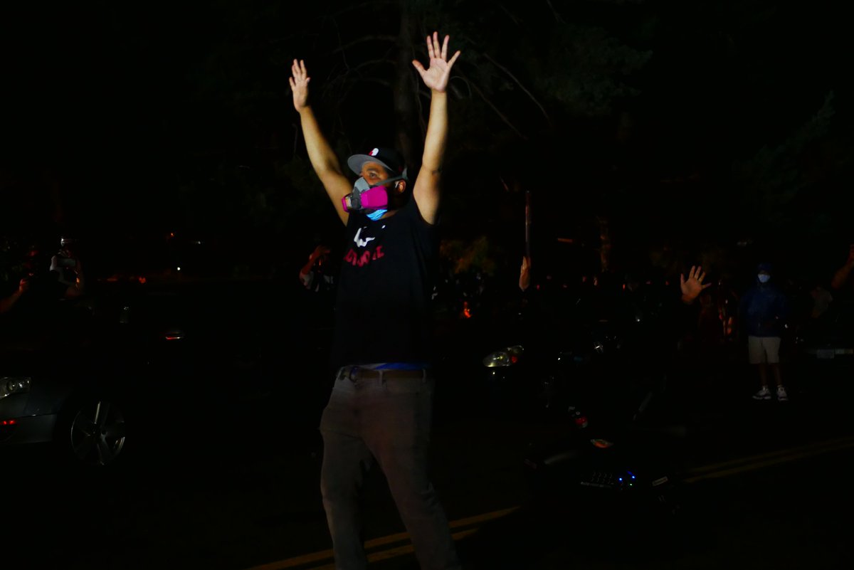 9/5 2301-2302 Protester raises his hands in front of advancing officers. Individual with speaker kneels as police pass. Shields pause ahead of the advance.  #pdxprotest  #BLM  #portland  #blacklivesmatter    #portlandprotest  #defendpdx  #BLMprotestsvideo:  https://twitter.com/BaghdadBrian/status/1302529592742141953