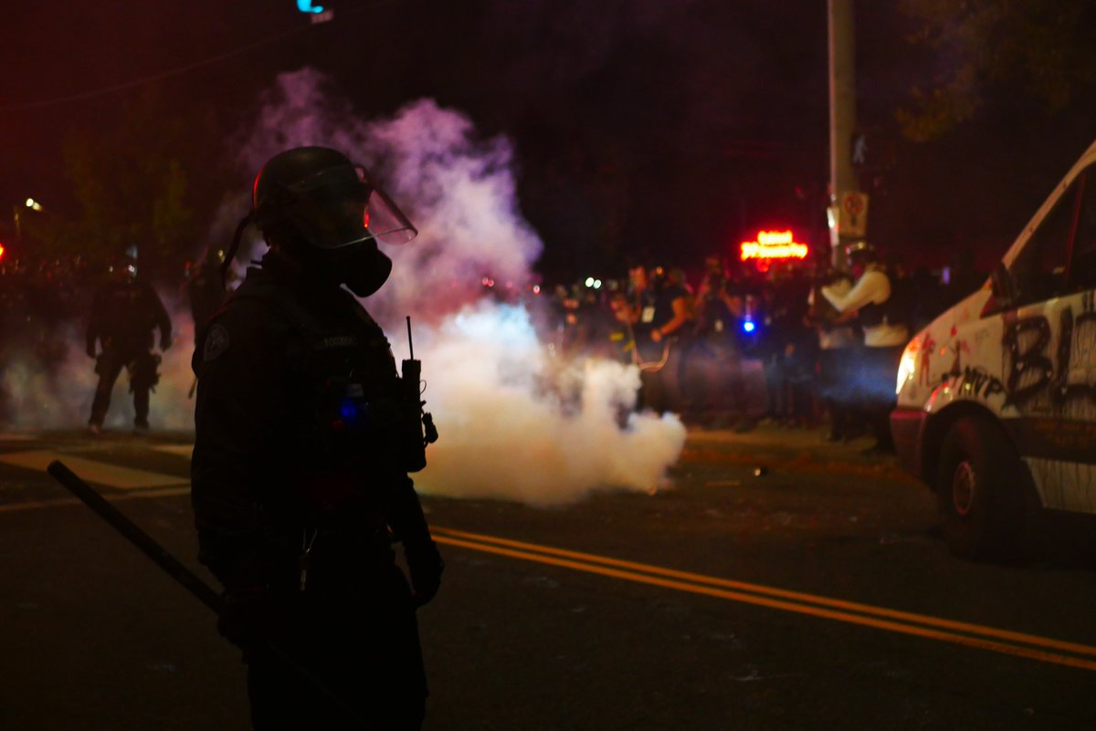 2256-2258 Officers fire munitions as protesters retreat to the north. Officer 31 appears to be looking for specific individuals in the crowd. #pdxprotest  #BLM  #portland  #blacklivesmatter    #portlandprotest  #defendpdx  #BLMprotestsvideo:  https://twitter.com/BaghdadBrian/status/1302527147559411712