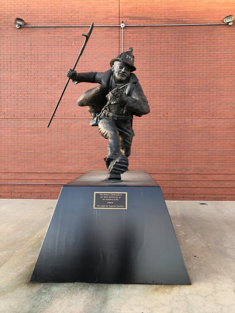 Firefrank76's tweet photo. In front of Building 12 at the #FDNY Fire Academy sits a bronze statue depicting #Firefighter Steven Siller as he ran through the Brooklyn Battery Tunnel responding to the WTC on 9-11-01. This statue honors our members lost that day listing all 343 of their names #NeverForget https://t.co/B4GgyHzSbr