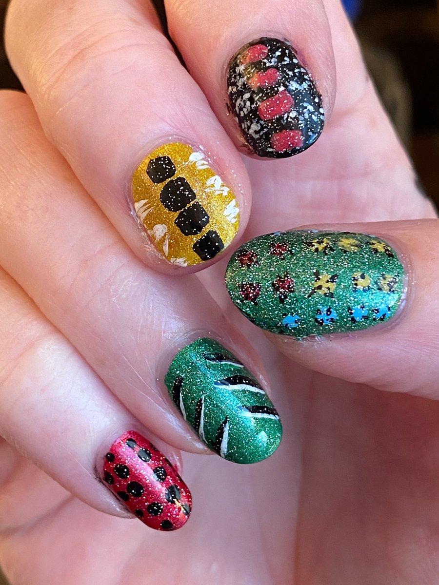 vexedmuddler's tweet photo. So @holotaco is having a cat-themed nail art contest, but they didnโt specify *felines*, so here are my caterpillar nails for #holotacocatsnailart - who can name all 10 species? https://t.co/3qRWPKyMwV