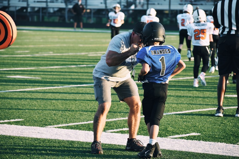 MrsLBrandes's tweet photo. Daddy-son football moment. Love watching these boys play their heart out. #EFND #decatureagles https://t.co/ag0bFiPoBK