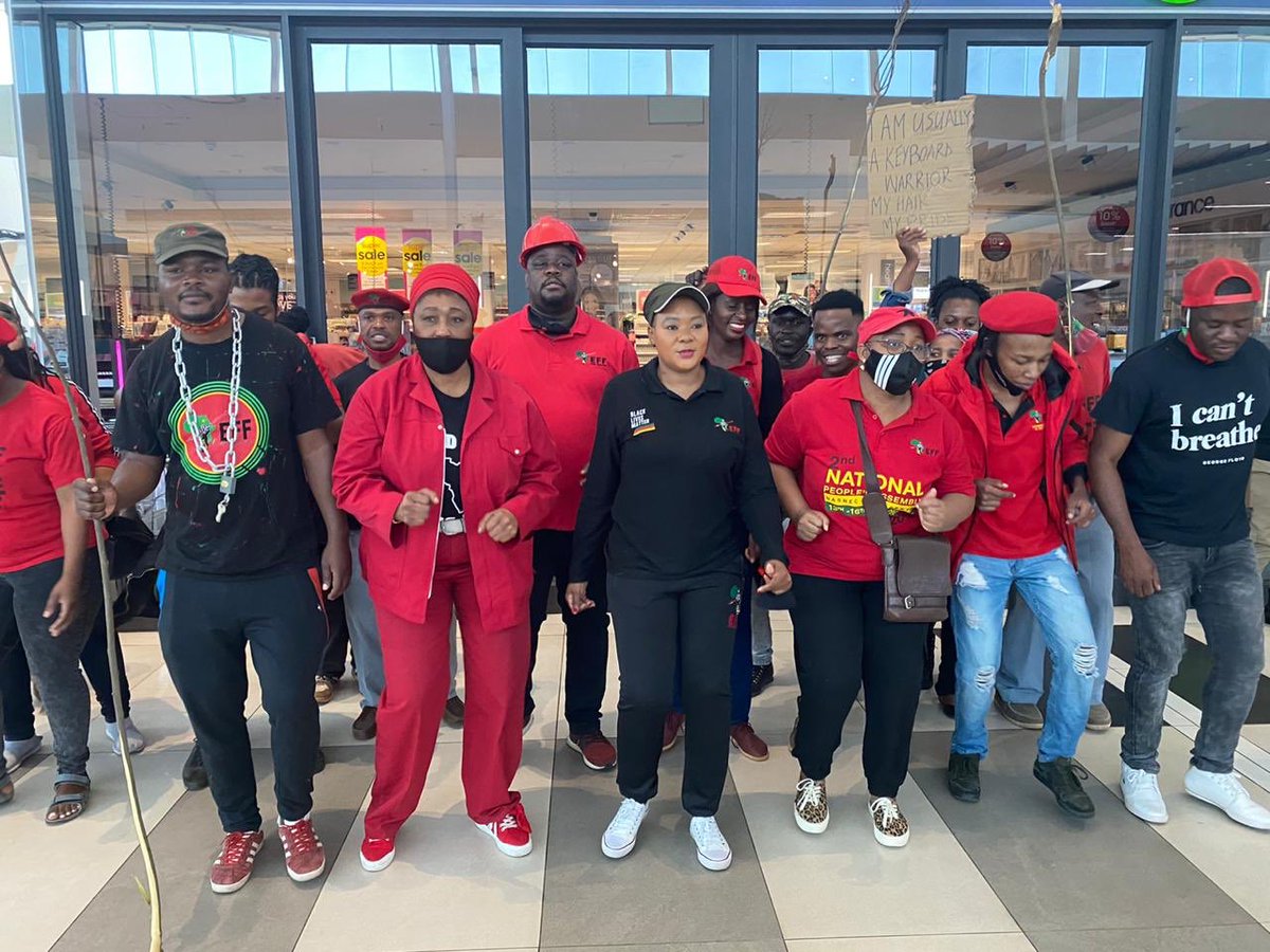 EFFSouthAfrica's tweet photo. Treasurer-General @OmphileMaotwe is outside Clicks at Menlyn Mall, Tshwane leading fighters and ground forces in the peaceful demonstration against the racist Clicks. #ClicksMustFall https://t.co/2KgAHskWYN
