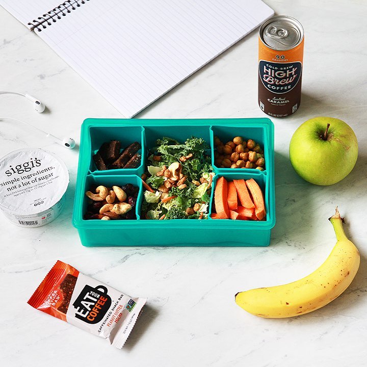 Lately, we've been "packing our lunch" to work at home. It's a simple way to get our routine going and make the kitchen table feel a bit more like an office!