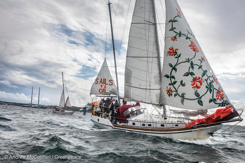 Greenpeace's tweet image. Sails for climate! Local sailboats &amp;amp; kayaks joined @gp_warrior to protest oil company Preem’s planned expansion of their refinery in Lysekil, Sweden. 
Prime Minister Stefan Löfven and the Swedish government must choose the Paris Agreement over Preem!
#PeoplevsOil #ParisOrPreem