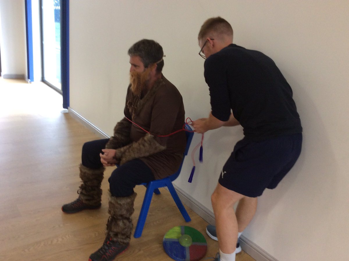StStephensPSch's tweet photo. Upper Key Stage 2 had an unusual visitor invade this morning - Ragnar the Viking! Luckily, we managed to apprehend him and tie him to a chair in the hall so that we could question him. We reckon we should write a description of him so that others can keep a lookout! 🗡🖊 https://t.co/yOkYII6Cd0