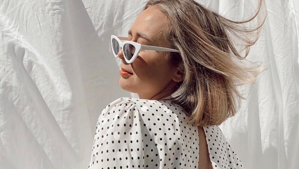 Life needs a few more polka dots! <a href="/meowkatcrowley/">Kat Crowley</a> looks so stylish in this <a href="/ronnykobo/">RonnyKobo</a> polka dot top! We love how she styled it with a pair of white sunnies. Check out her account for more style inspo!