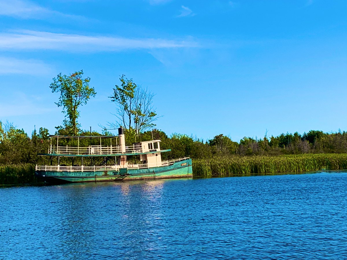GHOST SHIP OF THE RIDEAU...A little story on a forgotten 117yr old vessel lying dormant in the reeds on the Rideau River...anyone passing south of Hurst Marina will recognize her tarnished hull...Built as the SS Planet in 1903 in Buffalo, NY...