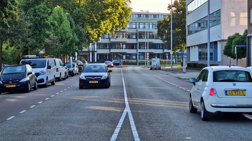 This one clearly demonstrates how silly this design is. Look how wide those lanes are. The only reason the bike lanes aren't raised is for the parking when there's clearly space to flip parking and bike lane around (5/9)