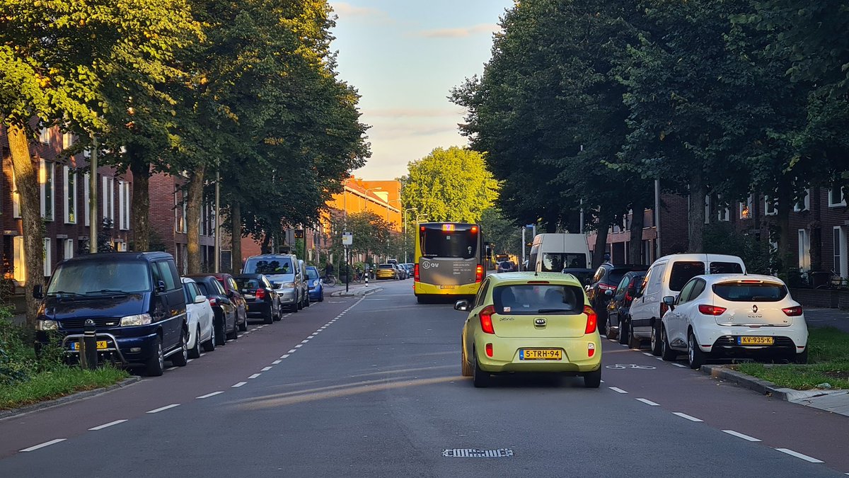 Marginally better. At least the car lane has narrowed a bit and there's no centre line. Probably would class this as an advisory bike lane which is mildly more reasonable. Still sub-standard. (6/9)