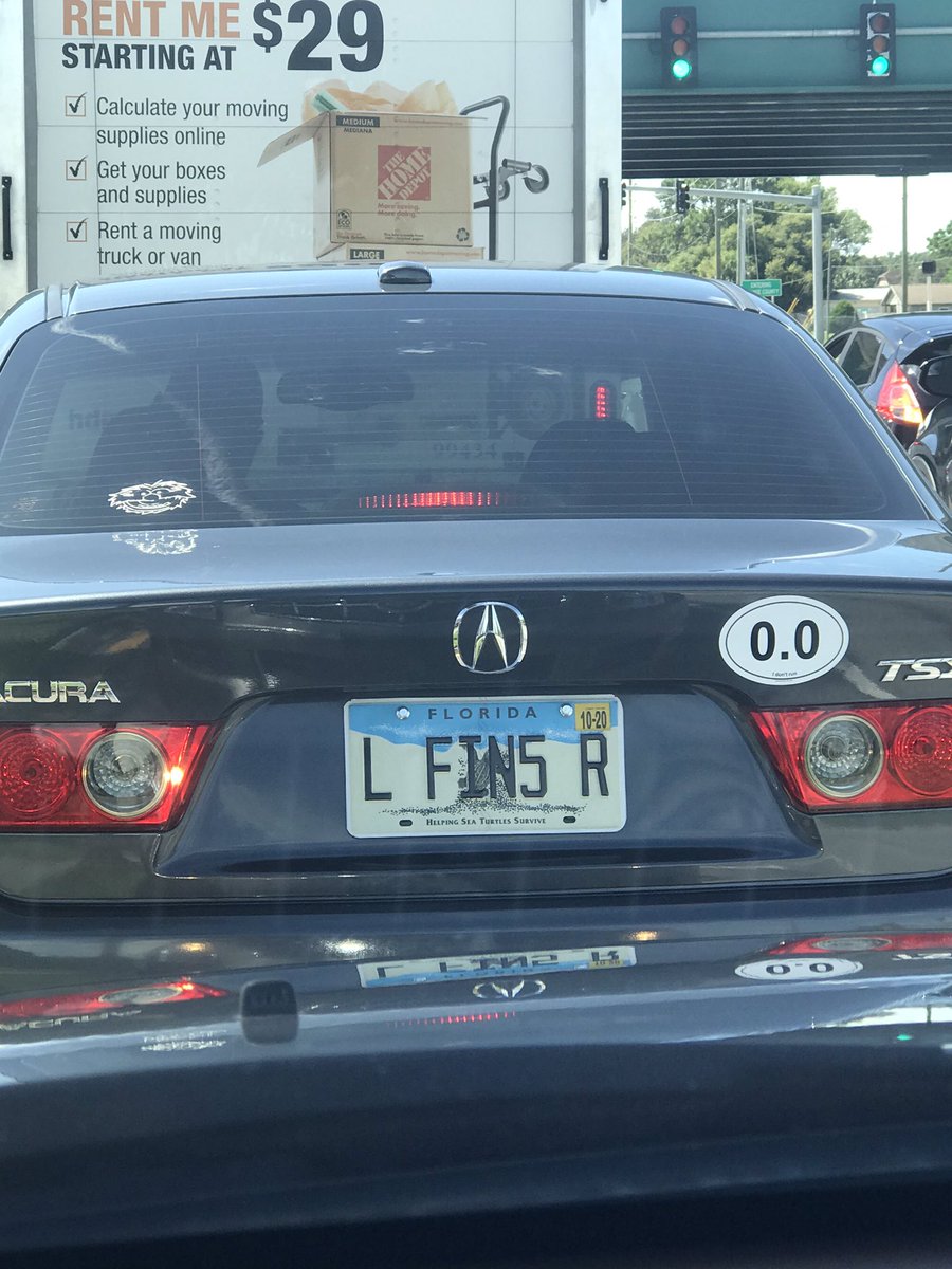 agorgz's tweet photo. Can’t be mad at this clever Jimmy Buffet vanity plate... #fins @PodcastTheRide https://t.co/5EoXX1QeNG