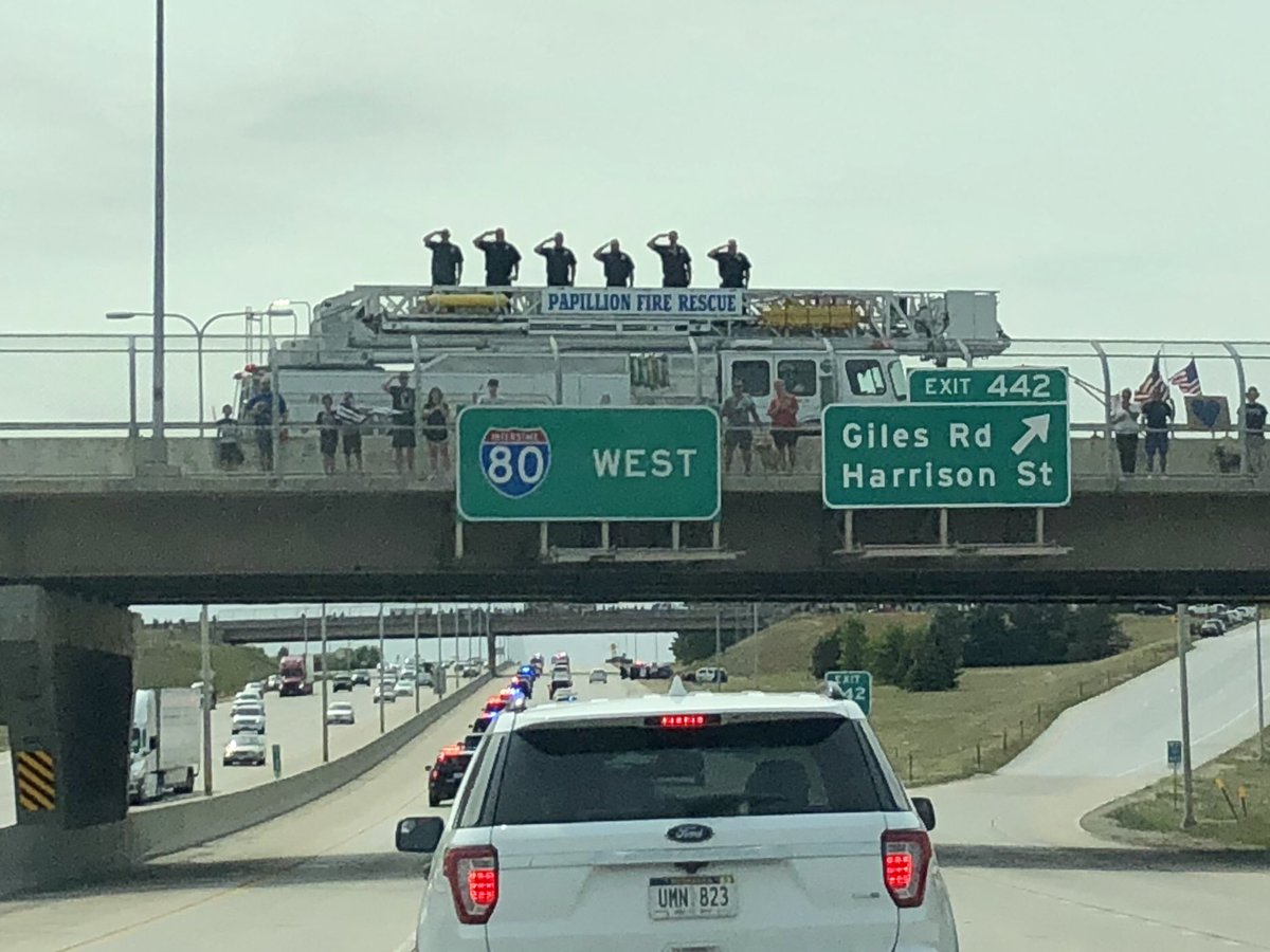OPDOfcBossman's tweet photo. The show of support from thousands of people lining the procession route for @Lincoln_Police Officer Mario Herrera was incredible. It was an honor to help escort him back to Lincoln. #1205 https://t.co/MwxF1UAg8h