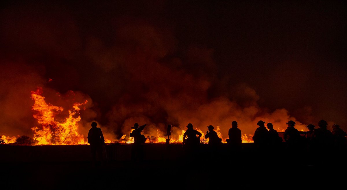 PE_Photo's tweet photo. Arroyo Grande Hotshots are silhouetted as they watch a backfire at Carter Street and Bears Den Ranch Road in Yucaipa on Sunday, September 6, 2020. (Photo by Terry Pierson, The Press-Enterprise/SCNG) https://t.co/hI2WdGMsbt