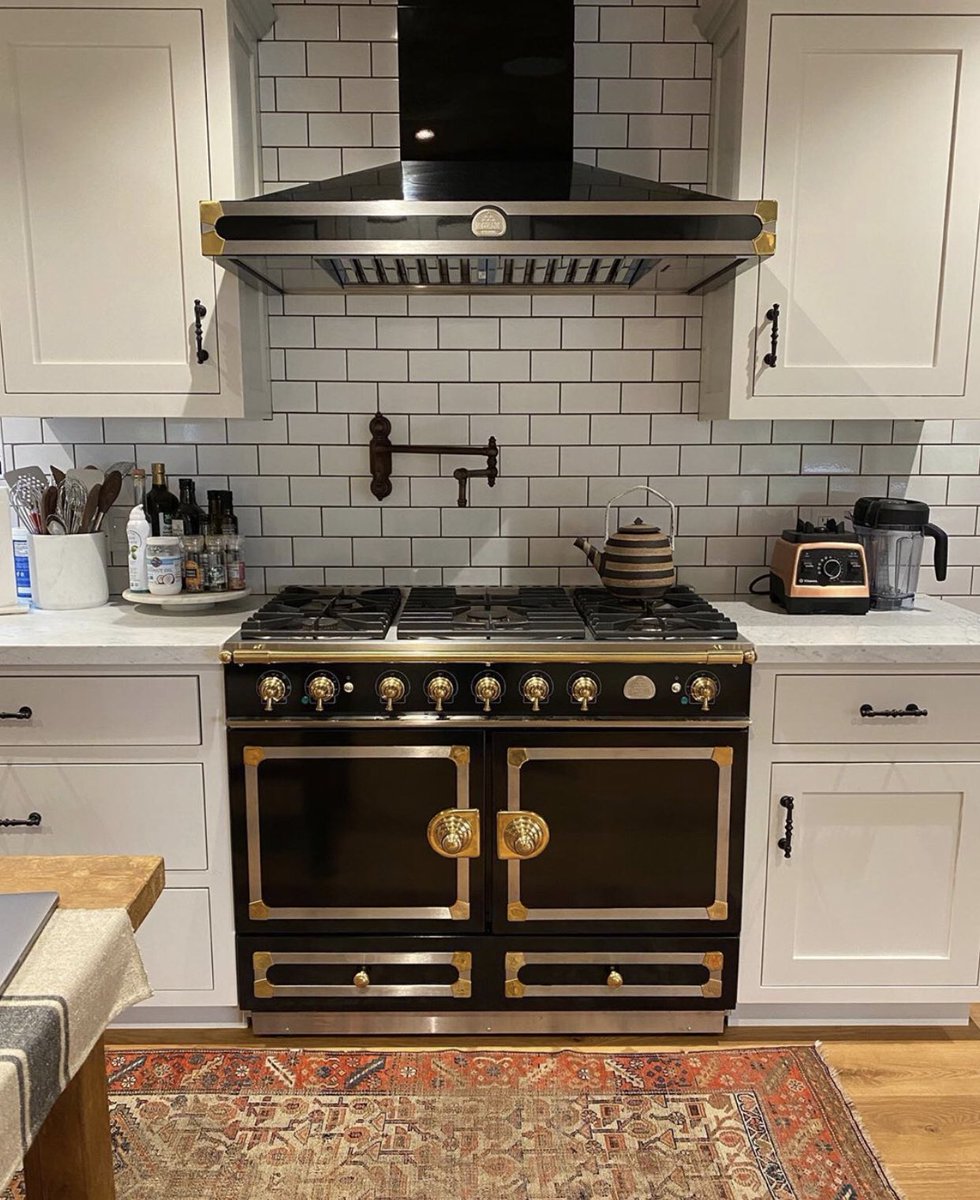ashleytisdale's tweet photo. Really happy with how this kitchen turned out. My dad bringing all my kitchen dreams to life 😍 I found my inspo on Pinterest and of course then I made it my own. The reclaimed ceiling was my dads idea! Also I have all my favorite stores In this kitchen! @michael.j.tisdale https://t.co/lItvtUfgXO