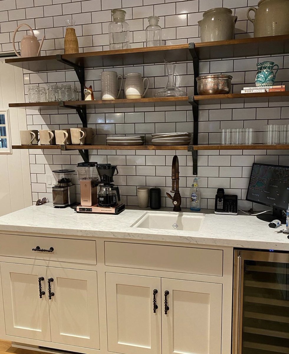 ashleytisdale's tweet photo. Really happy with how this kitchen turned out. My dad bringing all my kitchen dreams to life 😍 I found my inspo on Pinterest and of course then I made it my own. The reclaimed ceiling was my dads idea! Also I have all my favorite stores In this kitchen! @michael.j.tisdale https://t.co/lItvtUfgXO