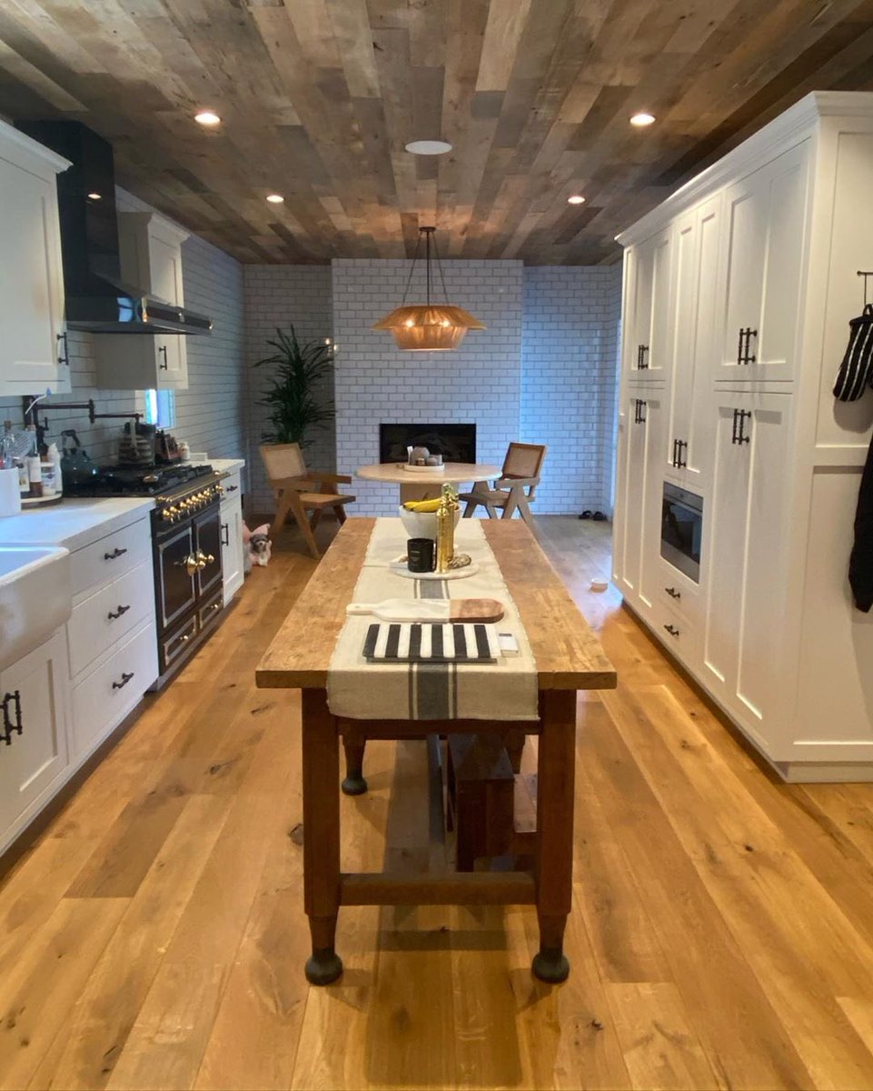 ashleytisdale's tweet photo. Really happy with how this kitchen turned out. My dad bringing all my kitchen dreams to life 😍 I found my inspo on Pinterest and of course then I made it my own. The reclaimed ceiling was my dads idea! Also I have all my favorite stores In this kitchen! @michael.j.tisdale https://t.co/lItvtUfgXO