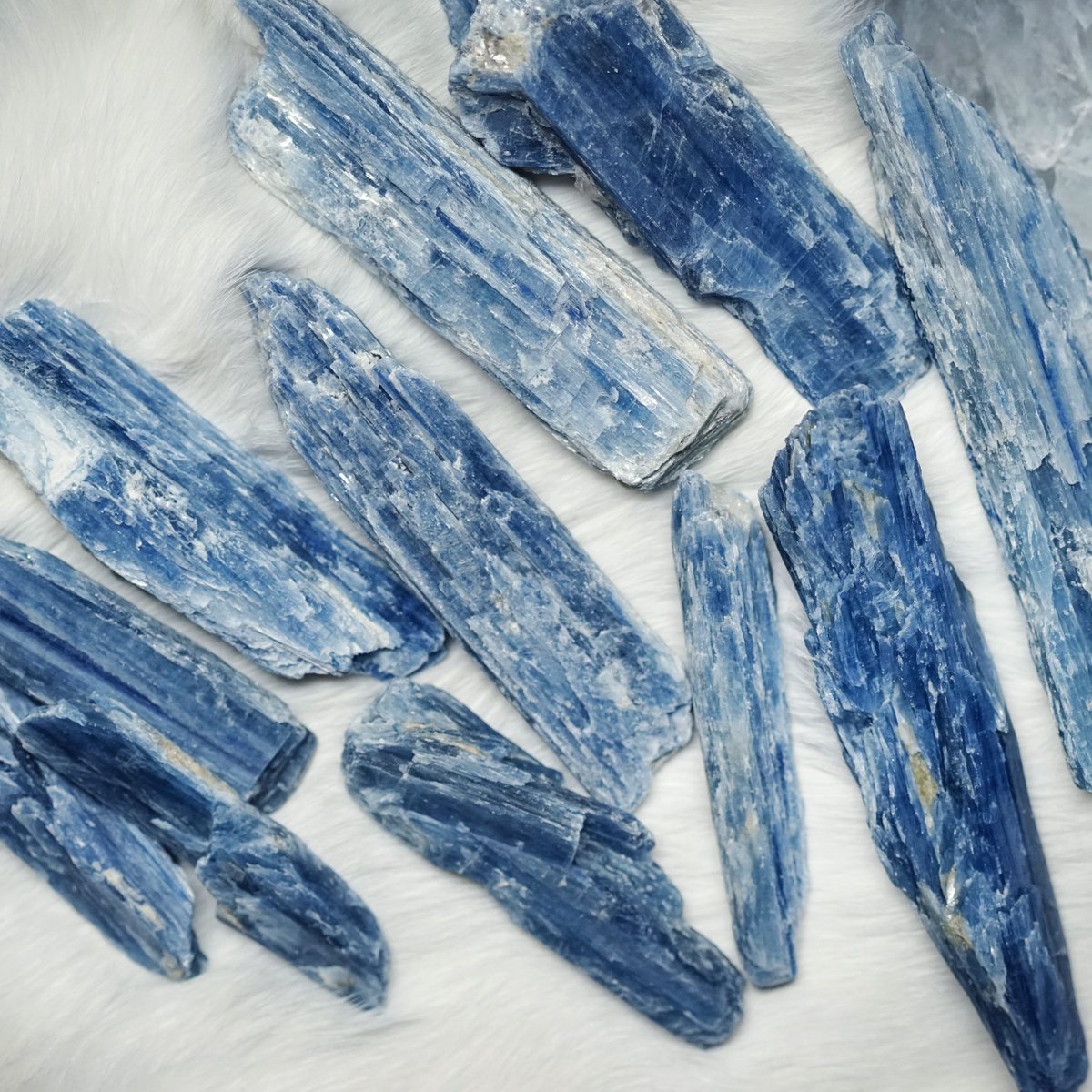 blue kyanite - helps to bring & balance all chakras into alignment- instills tranquility & sense of calm; excellent for meditation- can help to improve memory of dreams and bring healing ones - aids in creating and inducing better communication and self-expression