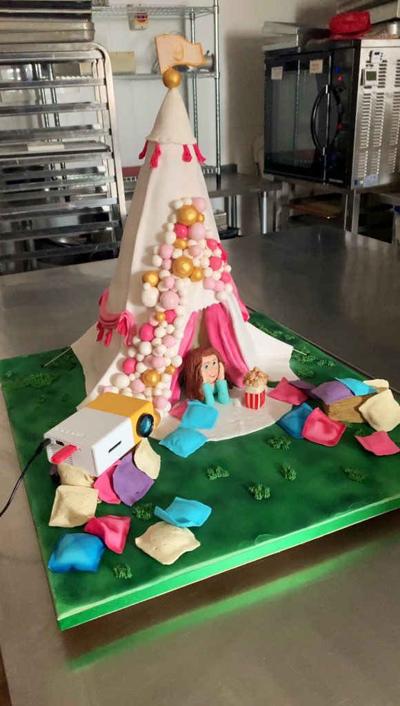 DaisyB2001's tweet photo. Well.... this is what the slightly dodgy looking cake turned into!! The projector is projecting a home video onto a screen! #cake #NotARudeCake #cakesculpture #daisybcreations https://t.co/H6noDBy5Jm